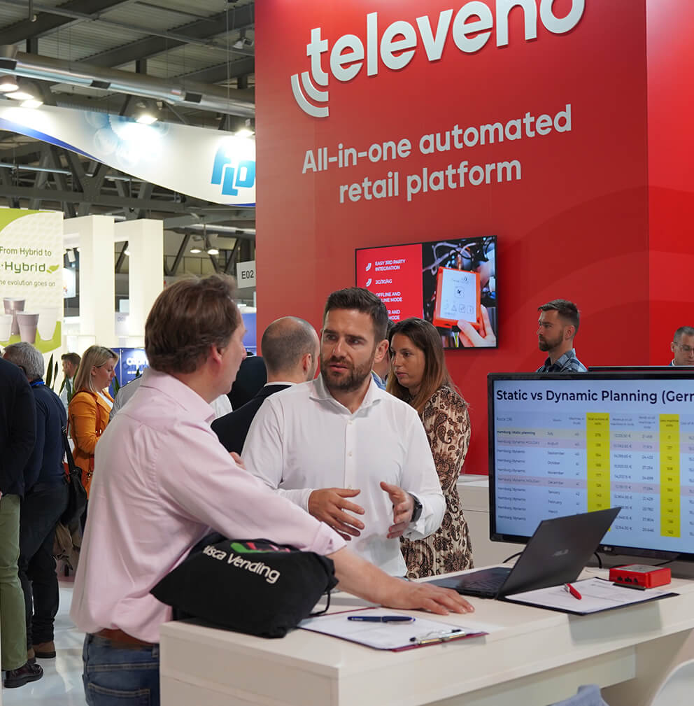 About-us-sales-at-the-fair Sales talk with a customer during the expo.